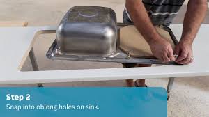 Using a high quality, waterproof sealant prevents water and debris from entering the gaps. How To Install A Sink Cabjaks Youtube