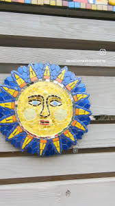 Just had to keep my new sun face mosaic art for myself. , ❤️💙 My backyard  fences.