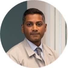 Dr. Cornelius Mitchell, MD