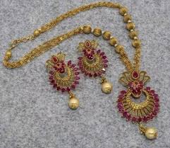 Gold haram designs in 50 grams are swanky and bold, specially designed for lavish events like weddings. New Golden Gundla Haram Necklace Designs