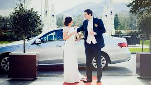 Bridesmaids in green with sunflower bouquets. Beautiful Killarney Wedding Venues For Your Big Day Weddingsonline