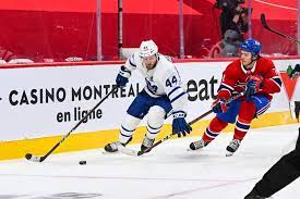 Montreal canadiens center jake evans was stretchered off the ice after taking a scary hit from winnipeg jets center mark scheifele. V8nf9apmeqpz8m