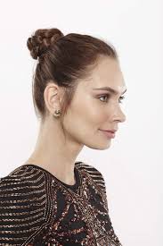 Delicate lines, loose strands, smoothness of skin, royal posture… large flower earrings add. 13 Easy And On Trend Bun Hairstyles For Every Occasion