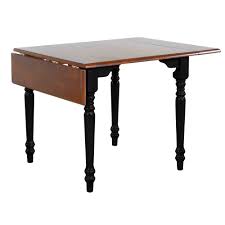 This elongated dining table seats anywhere from 4 to 6 people total when the drop leaf sides are locked in place. Drop Leaf Dining Table Antique Black With Cherry Finish Sunset Trading