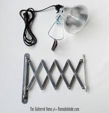 Remodelaholic Diy Accordion Wall Lamps From 5 Ikea Mirrors Ikea Mirror Wall Lamp Lamp