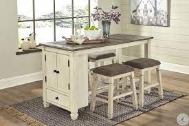 It's also 'counter size,' meaning it's slimmer and taller than regular sizes of dining sets. Bolanburg Two Tone Counter Height Dining Room Set From Ashley Coleman Furniture