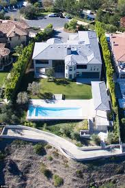 Kim Kardashian And Kanye West Are Sinking Millions Into 20m Mansion Bel Air Mansion Mansions Kim House