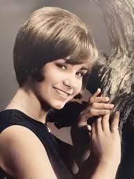 Sharing a cherished wallet photo of your wife from 1967