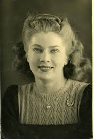 Mother and her three kids posing for a photo