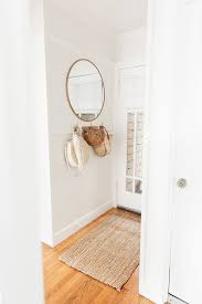 Step Inside A Dreamy 1940s Sausalito California Home Wall Mirrors Entryway Entryway Mirror Round Wall Mirror Umbra peek entryway mirror with hooks, wall mount white mirror with five hooks, white finish.