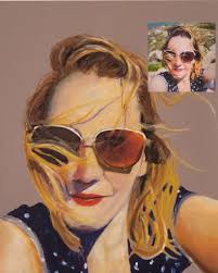 Me sat with my self portrait Oil pastels