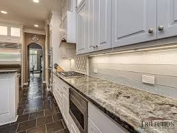 3cm bathroom blue counter tops counters countertops granite indoor iridescent kitchen labradorite lemurian premium masterpiece natural natural stone polished stone. Kitchen Labradorite Green Australe Granite Countertops After Trifection Remodeling Construction