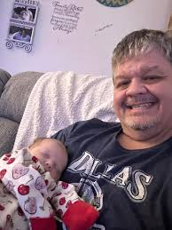 Chris Combs holding pure joy in his arms ❤️