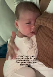 Adorable Newborn Snuggles: A Heartwarming Mom and Baby Moment