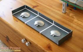 Three Shells From Demolition Man Bathroom Decor Mens Bathroom Decor Man Bathroom Demolition Man