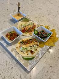 Maybe you would like to learn more about one of these? Baja Fish Tacos With Homemade Watermelon Mango Salsa And Chipotle Crema Served With Black Beans And Chips Ratemyplate