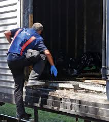 Bodies Of Around 200 Victims Whose Plane Was Shot Down Over Eastern Ukraine On Thursday Decaying On A Train Rubbish Truck Victims Body