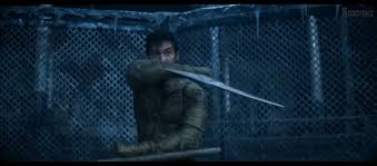 Cole young (lewis tan) is a new character to the franchise, but director simon mcquoid ties him into the mythology of the series with ease. Cole Young Wielding A Bladed Tonfa Mortalkombat