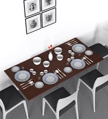 Some are expandable while others are a single piece. Buy Ray Wall Mounted 4 Seater Dining Table In Brown Colour By Auspicious Home Online Modern 4 Seater Dining Tables Dining Furniture Pepperfry Product