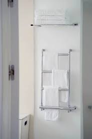 A towel rack that's also a chair. 15 Awesome Bathroom Towel Rack Ideas Home Decor Bliss
