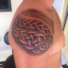 Many women inked a tattoo of a celtic cross on their wrist, fingers, hands, neck and other body parts. Celtic Tattoos Meanings Tattoo Designs Ideas