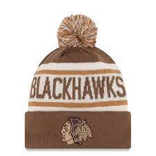 Men S Chicago Blackhawks New Era Brown Biggest Fan Redux Knit Hat With Pom Brown Blackhawks Chicago Blackhawks New Era