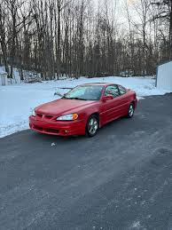 Image result for Red Brown 2004 Pontiac