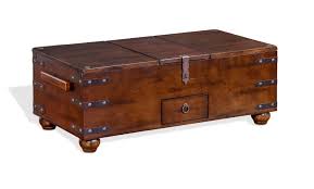 Cream fabric top with wood legs. Sunny Designs Santa Fe Trunk Coffee Table In Dark Brown 3166dc2 C