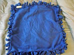 Learn how to make a tie blanket from fleece using this easy method! Diy No Sew Baby Blanket Day By Day Masterpiece