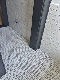 I plan to use white grout on the subway and penny tile on the shower floor, and gray grout on the gray hex on the bathroom floor, so that should reduce the business factor. Found On Bing From Www Pinterest Com Penny Round Tile Bathroom Bathroom Floor Tiles Penny Tiles Bathroom