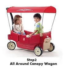 Compare Kids Pull Along Canopy Wagons Radio Flyer Or Step2
