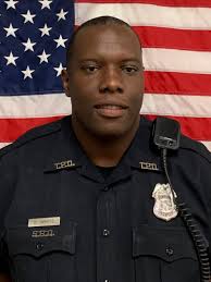 Police in the sideview mirror pulling over car. Black Police Officer Fired For Using N Word While On Duty Wkrc