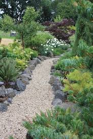 15 Beautiful Diy Garden Path Ideas To Create Perfect Walkway The Art In Life In 2020 Conifers Garden Gravel Garden Beautiful Gardens