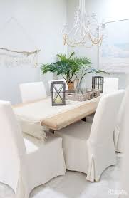 Why I Love My White Slipcovered Dining Chairs House Full Of Summer These Ikea Chairs Are The White Dining Room Dining Room Sets Coastal Dining Room Decor