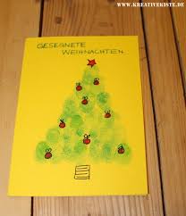 Bereitet fingerfarben und einen feuchten lappen vor. Weihnachtskarten