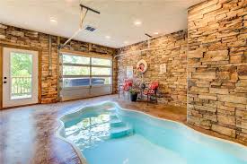 It is perfect for families to get together, play arcade games, or shoot some pool together. Pigeon Forge Cabins With Swimming Pool Access