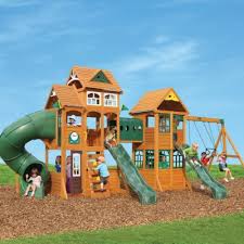 Accessorize an outdoor playhouse with outdoor furniture so that the little ones have a place to sit and enjoy activities. Kidkraft Paramount Wooden Playset Sam S Club