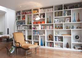 If All Your Possessions Bring Unadulterated Pleasure You Are Not Only Blessed But Unusual Most Of Us Are Apparently Struggli Home Living Room Shelves Shelves
