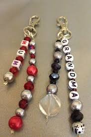 A key chain made of colourful wooden beads complements your single key or bunch. Handmade Bag Charms For That Special Personalised Gift Beaded Keychains Beaded Jewelry Planner Charms