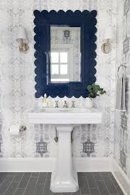 navy blue scalloped mirror flanked