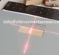 Laser for removing paint from back side of mirror ...