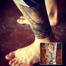 Justin Bieber Tattoo Guide Justin Bieber Tattoos Celebrity Tattoos Famous Tattoos