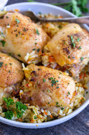 This award winning stuffed chicken with apple gravy uses pine nuts, spinach, currants and garlic with a savory apple gravy to finish off this easy dinner recipe! Rice Stuffed Chicken Thighs Momsdish