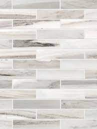 While the original tiles are still as popular today, subway tiles now come in a variety of sizes that mimic the original rectangular proportions, such as 1x2 or 4x8. Modern White Gray Subway Marble Backsplash Tile