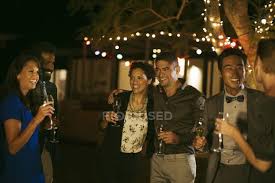 Check spelling or type a new query. Friends Laughing Together At Party Celebrating Night Stock Photo 199369524
