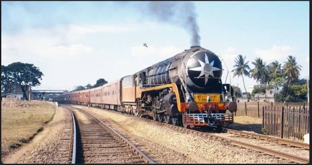 Indian Railways Class WP 4-6-2 steam locomotive No. 7724, built at Chittaranjan Locomotive Works in 1966, powering ahead with a passenger train in 1968. An era when steam ruled the rails -