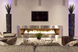 Here are some fireplace inspiration photos to get your motivated on how to showcase a what many consider to be a focal point of the living room. Modern Living Room Modern Fireplace Design Ideas