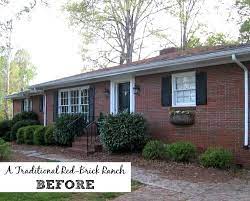 Beautiful red brick ranch house. Giving A Basic Red Brick Ranch Modern Curb Appeal Hooked On Houses Brick Ranch Painted Brick House Ranch House Exterior