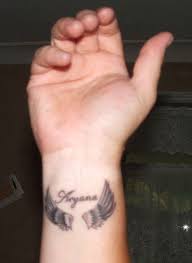 Small Angel Wings Tattoo Design On Wrist Tattoobite Com Wing Tattoo Designs Tattoo Designs Wrist Small Angel Wing Tattoo