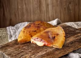 Calzoni a forno prosciutto e mozzarella. Panzerotti Con Prosciutto Cotto E Mozzarella Negroni